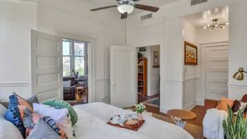 1 bedroom, desk, iron/ironing board, travel crib