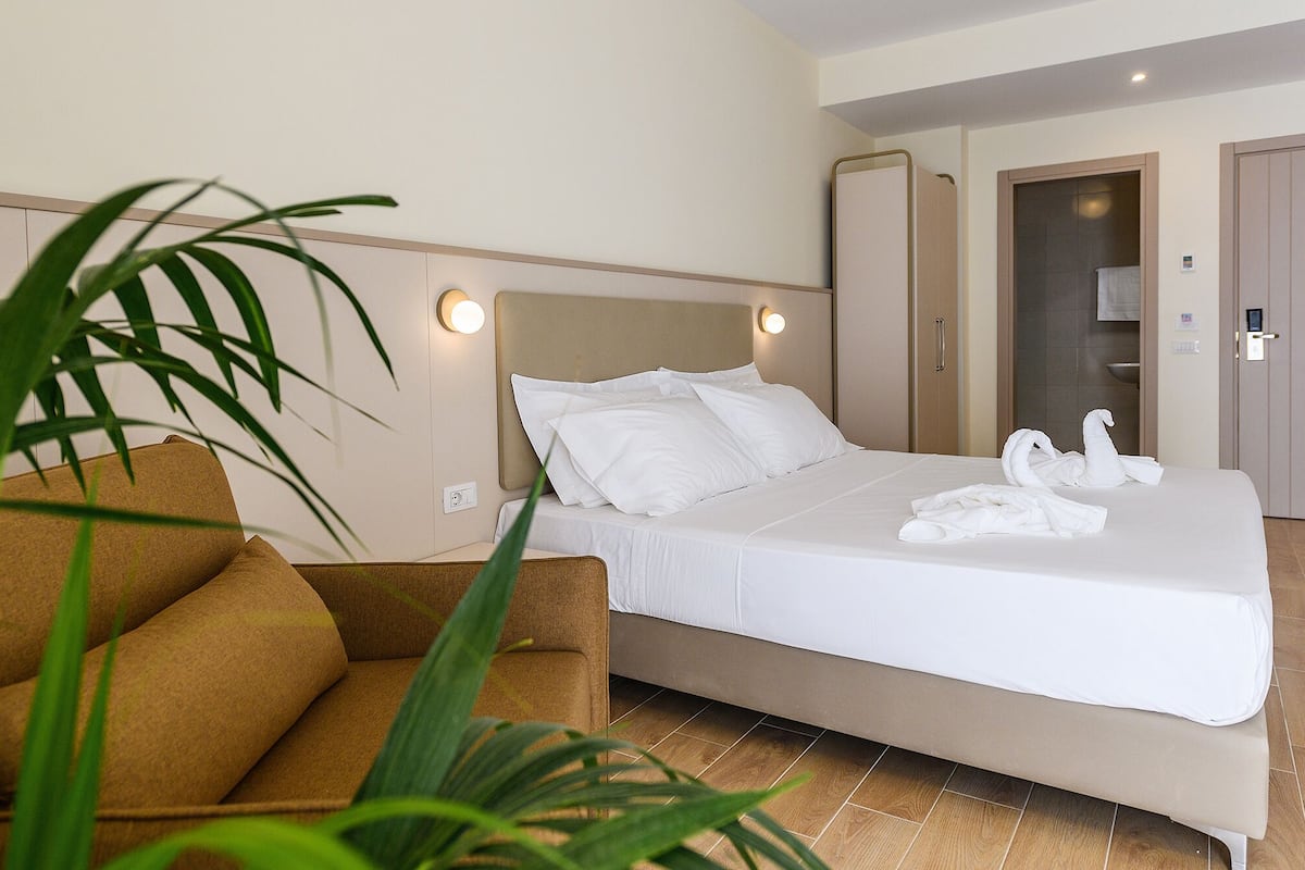 Standard Double or Twin Room | In-room safe, blackout curtains, iron/ironing board, free WiFi