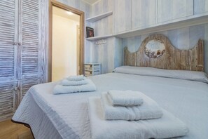 2 habitaciones, tabla de planchar con plancha, internet y ropa de cama 