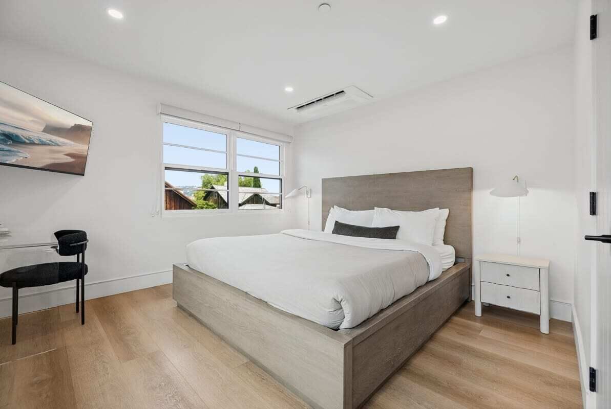 Premium bedding, laptop workspace, blackout drapes, iron/ironing board