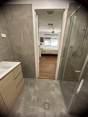 Shower, hair dryer, towels, soap