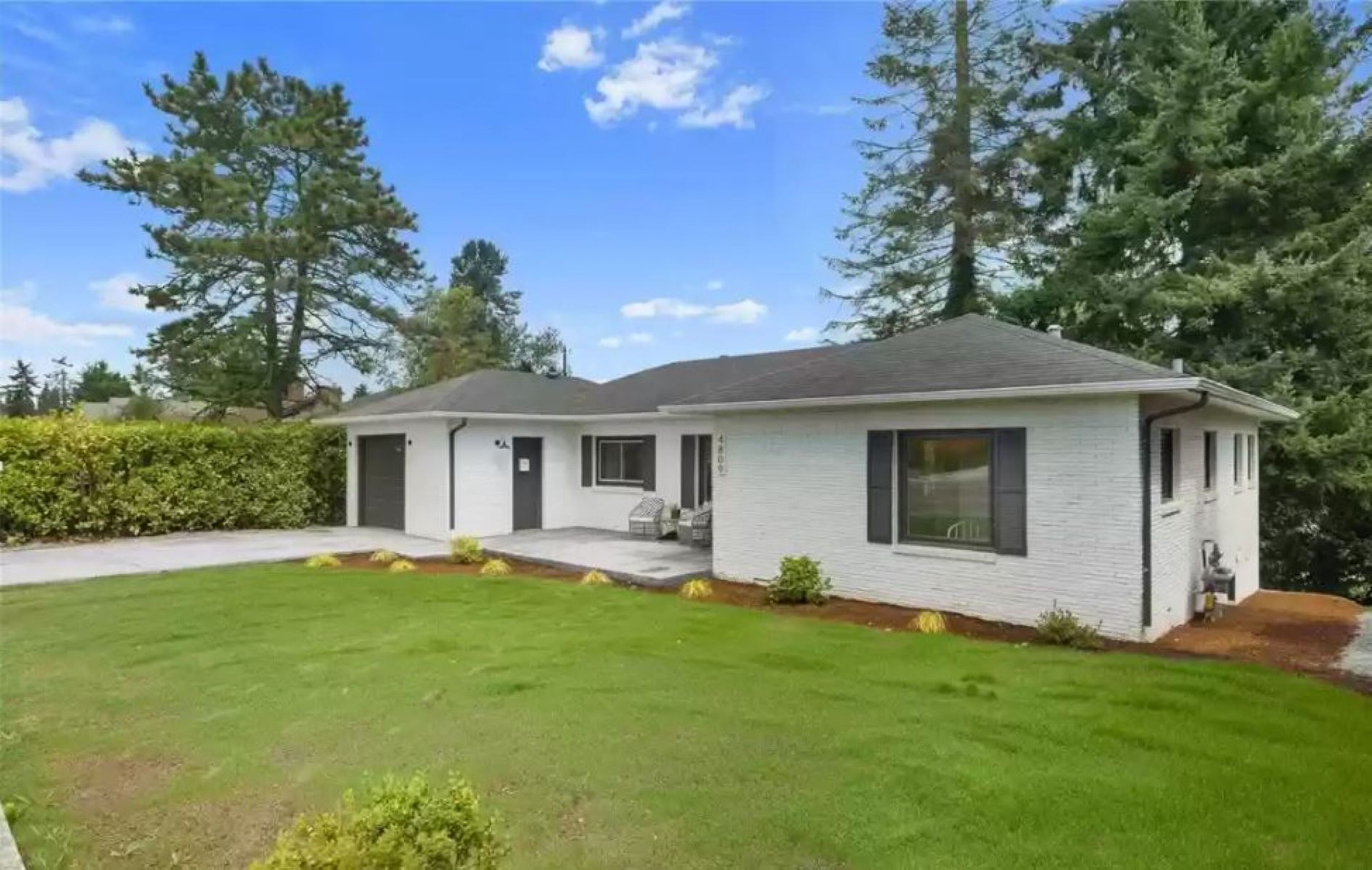 Two-story home with spacious yard, washer/dryer & central AC- dog-friendly