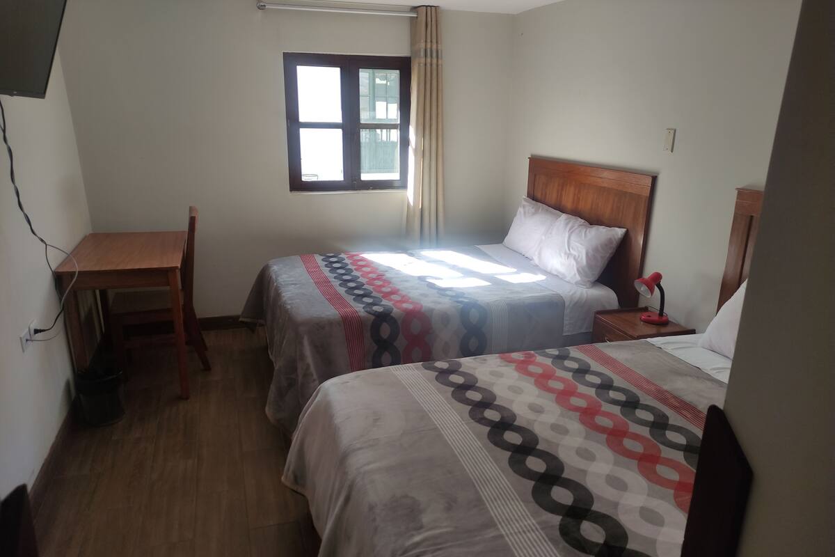Standard Twin Room, 1 Bedroom | Individually furnished, laptop workspace, free WiFi, bed sheets