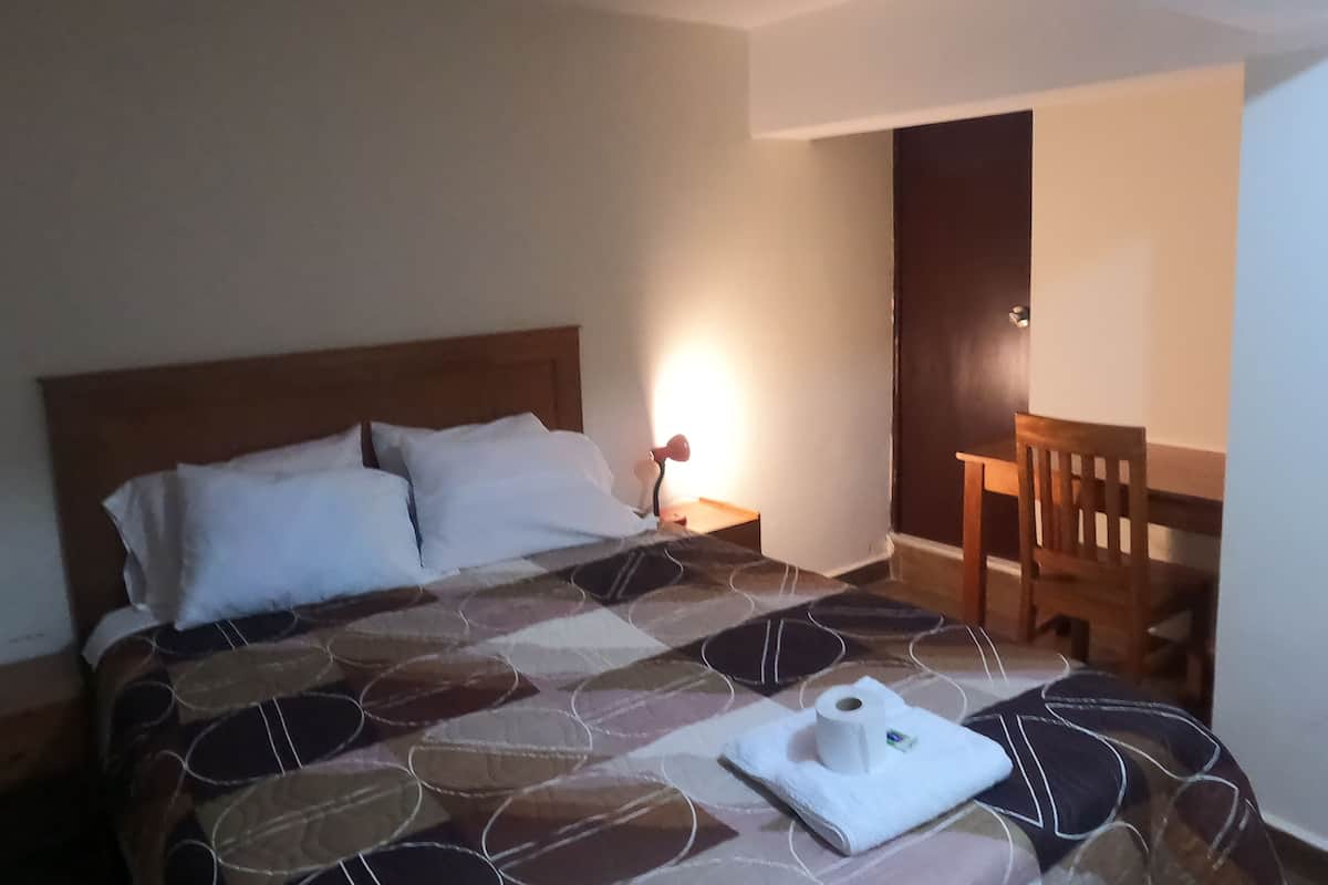 Classic Room, 1 Queen Bed | Individually furnished, laptop workspace, free WiFi, bed sheets