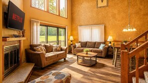 After a day on the hill, settle into the living room by the fireplace to relax before dinner or another round of games downstairs.
 - Roomy Beautiful Golf/Ski Condo (Clymer)