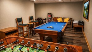 Finished basement game room is the review-favorite floor: pool and foosball run nightly so kids scatter down here while dinner comes together upstairs.
 - Roomy Beautiful Golf/Ski Condo (Clymer)
