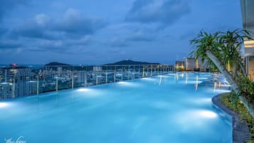 Outdoor pool, open 8:00 AM to 8:30 PM, pool umbrellas, pool loungers