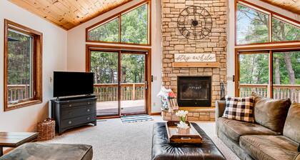 Secluded lake retreat with game room; near beach, boat rental, dining, and golf