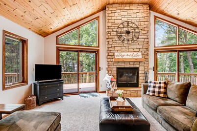 Secluded lake retreat with game room; near beach, boat rental, dining, and golf