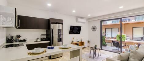 Fridge, microwave, stovetop, coffee/tea maker