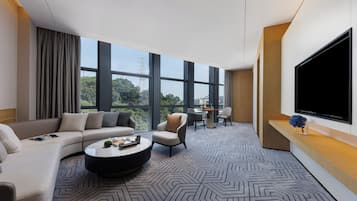 Habitación ejecutiva | Baño | Regadera y toallas