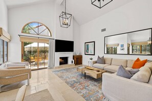 Smart TV, fireplace, smart speakers, stereo