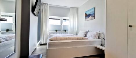 2 عدّة غرف نوم وواي فاي مجانًا وملاءات أسرّة