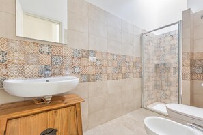 Villa | Bathroom | Shower, rainfall showerhead, hair dryer