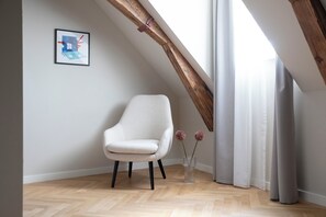 Superior Room | Living area | 55-inch LED TV with cable channels, TV