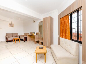 Honeymoon Room | Premium bedding, desk, soundproofing, free WiFi - Hotel Galaxy (Surat)