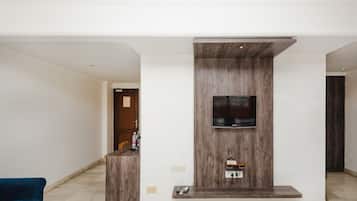 Royal Quadruple Room | Living area | 46-inch LCD TV with satellite channels, TV