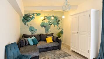 Exclusive Apartment | Living area | 123-cm LED TV with digital channels, TV