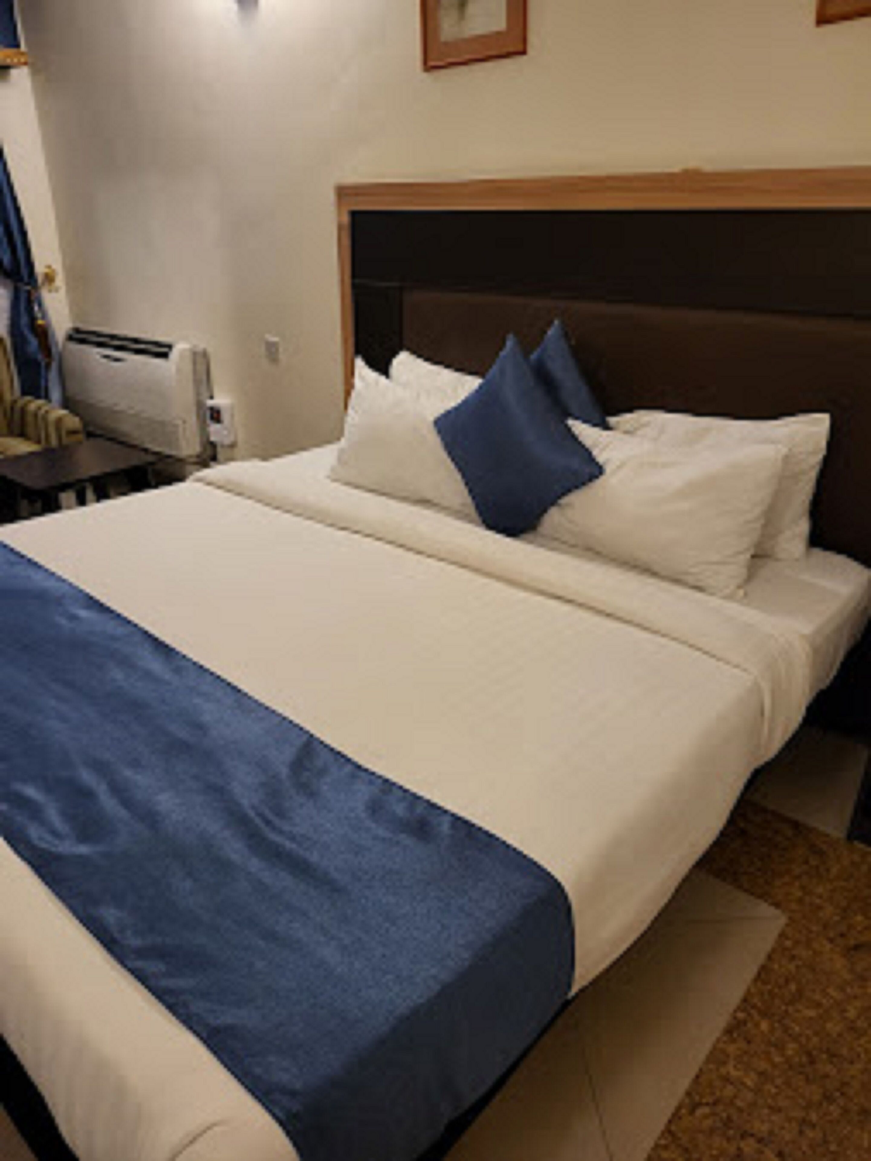 Premium bedding, down comforters, desk, laptop workspace