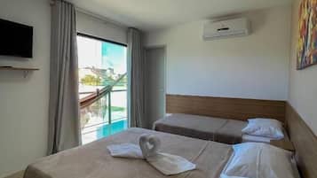 Exclusive Triple Room | Minibar, individually furnished, laptop workspace, bed sheets