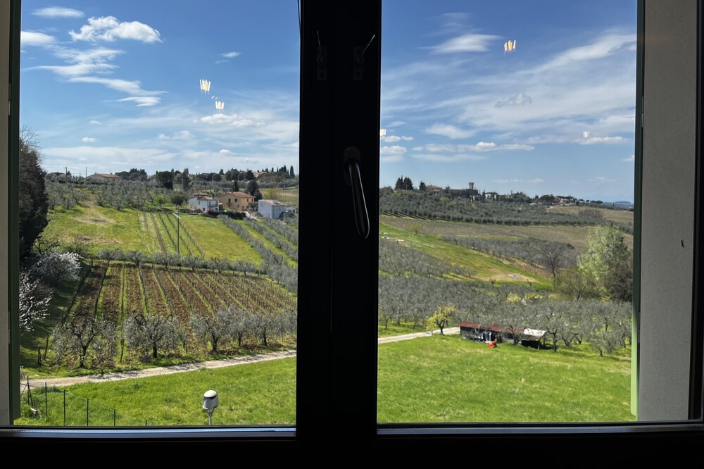Modern Tuscany Condo with Views