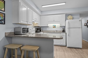 Condo, 2 Bedrooms | Private kitchen | Coffee/tea maker, fridge, oven, toaster