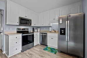 Condo, 2 Bedrooms | Private kitchen | Fridge, oven, coffee/tea maker, toaster - Anchors Away Unit 4 2 Bedroom Duplex by RedAwning (Atlantic Beach)