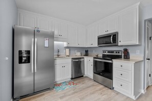Condo, 2 Bedrooms | Private kitchen | Fridge, oven, coffee/tea maker, toaster - Anchors Away Unit 1 2 Bedroom Duplex by RedAwning (Atlantic Beach)