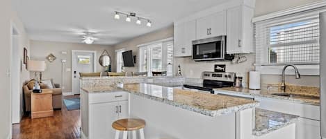 Condo, 2 Bedrooms | Private kitchen | Fridge, oven, coffee/tea maker