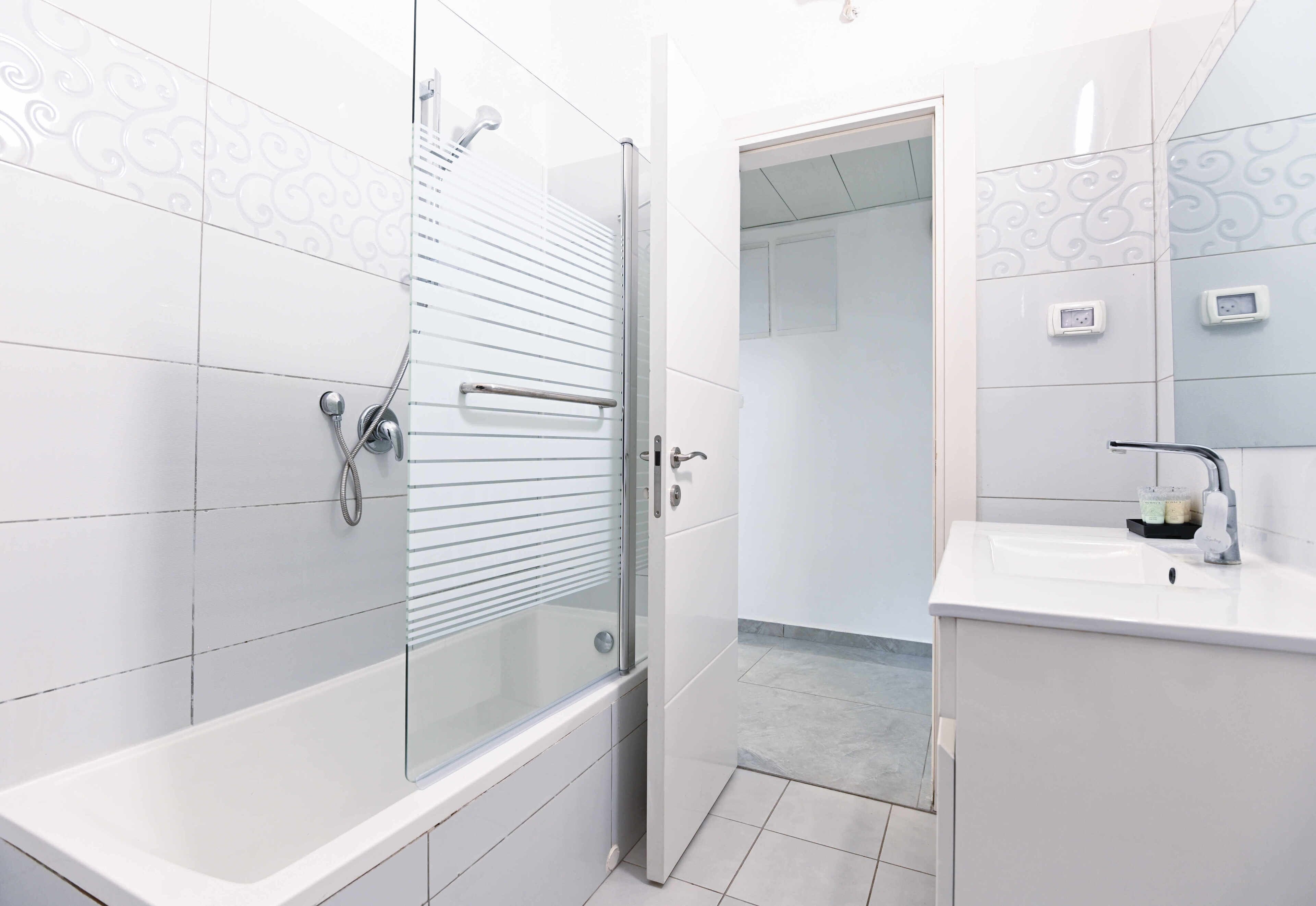 Villa | Bathroom | Rainfall showerhead, hair dryer