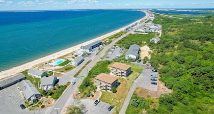 Charming coastal studio with private beach access, scenic patio, grill, & games