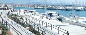 Stroll along the marina's paved walkway, taking in the serene views of the calm waters and surrounding landscape.