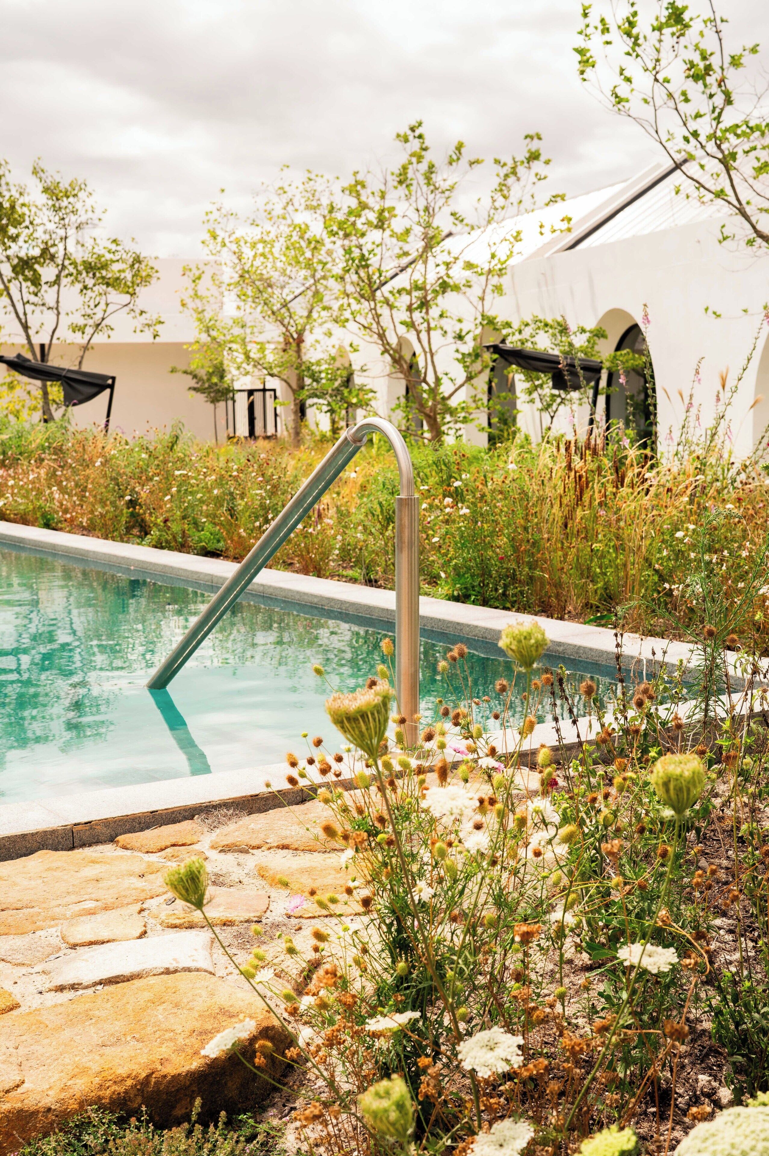 Outdoor pool, pool umbrellas, sun loungers