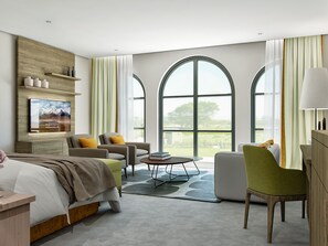 Ropa de cama de alta calidad y caja de seguridad en la habitación 