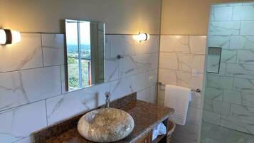 Shower, hair dryer, towels, soap