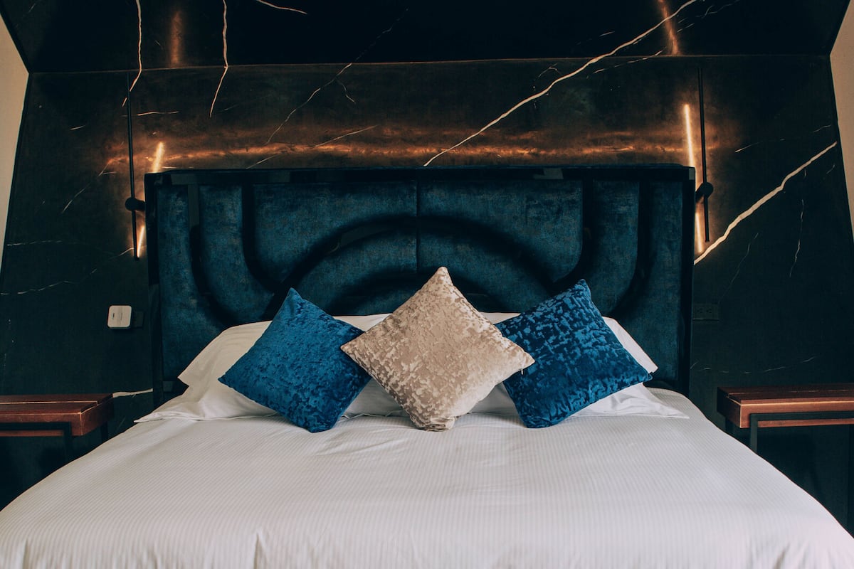 elite cabin | premium bedding, down duvets, memory-foam beds, minibar