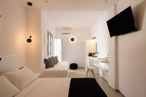 Deluxe Triple Room | Egyptian cotton sheets, premium bedding, in-room safe, desk - Tatakis Design Hotel, Fira (Santorini)