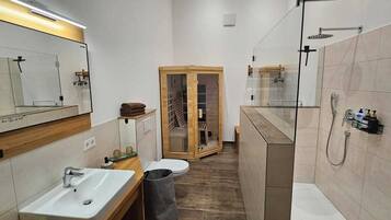 Shower, hair dryer, towels, soap