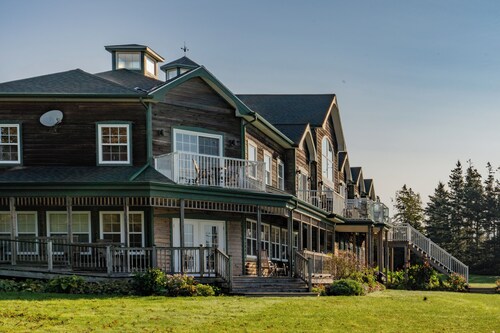 Ground level waterfront 2 bedroom with wrap around porch