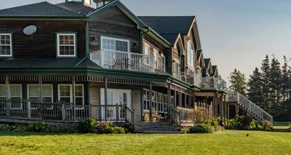 Ground level waterfront 2 bedroom with wrap around porch