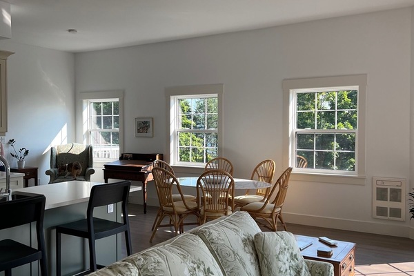 Spry 6 living room, dining area and kitchen overlooking the water