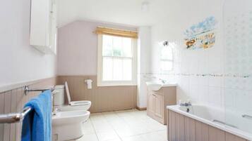Cottage | Bathroom | Combined shower/tub, deep soaking tub, towels
