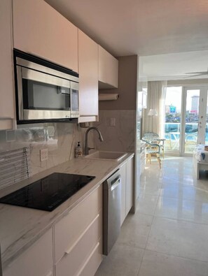 Fridge, microwave, dishwasher, coffee/tea maker