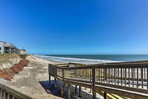 A wooden boardwalk leading to a beach with a clear view of the ocean. - Topsail Beach Oceanfront Oasis w/ Stunning Views! (Sneads Ferry)