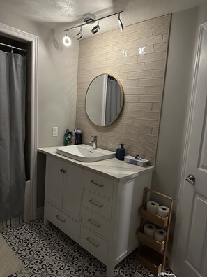 Hair dryer, towels, soap, shampoo