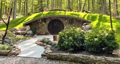 WOW! A spectacular Hobbit House in the forest at June Farms!