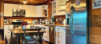 A spectacularly charming LAKE HOUSE on gorgeous Burden Lake!