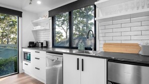 Dishwasher, coffee/tea maker, dining tables