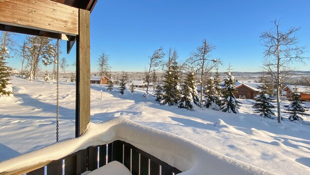 A snowy landscape with wooden buildings and trees. - Stunning home in Gol with sauna (Gol)