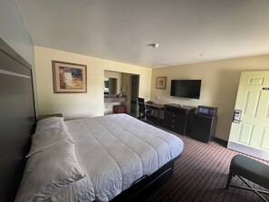 Standard Single Room, 1 King Bed, Non Smoking | Living area | 40-inch LED TV with satellite channels, TV